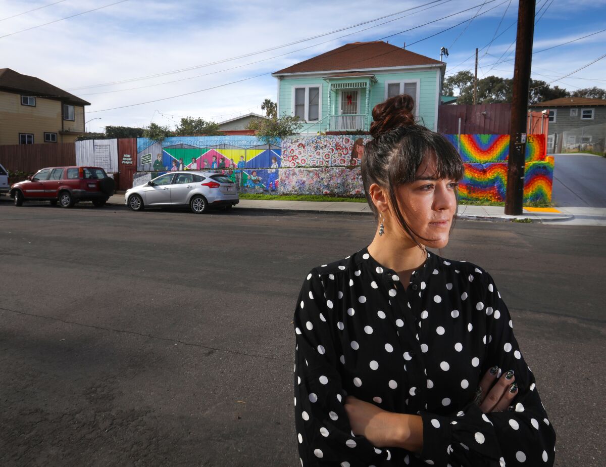 Local artist Carolyn Osorio organized other artists and created a multi-panel mural in front of where she lives in Barrio Logan. Her panel to the far left side of the mural, "Tips for Developers Who Want to Gentrify," directly addresses the gentrification of the art gallery scene in the neighborhood that have been forced out and replaced by trendy shops.