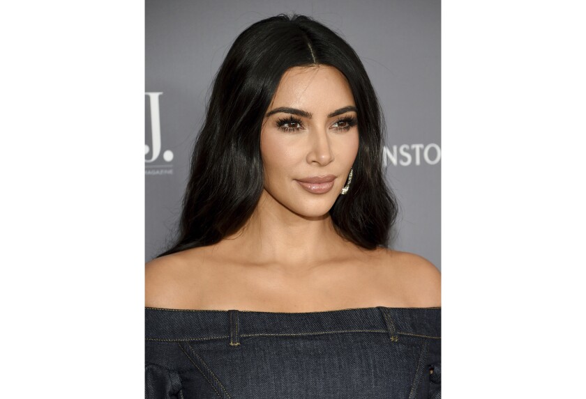 FILE - This Nov. 6, 2019 file photo shows TV Kim Kardashian West at the WSJ. Magazine 2019 Innovator Awards in New York. A California government worker is behind a mystery social media handle that’s been cranking out droll posts from North West’s point of view since Kim’s eldest was born seven years ago. The reveal of Natalie Franklin, 35, of Sacramento, appeared on Thursday night's “Keeping Up With the Kardashians.”(Photo by Evan Agostini/Invision/AP, File)