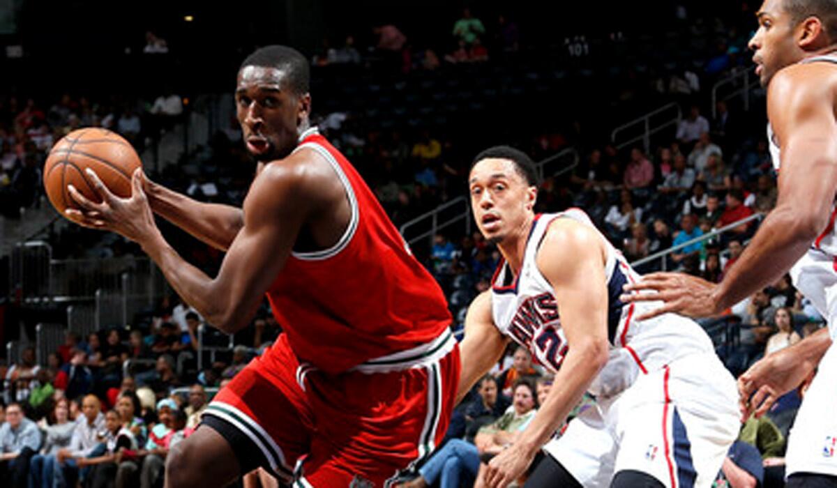 Ekpe Udoh, at the time with the Milwaukee Bucks, drives against the Atlanta Hawks during a game.