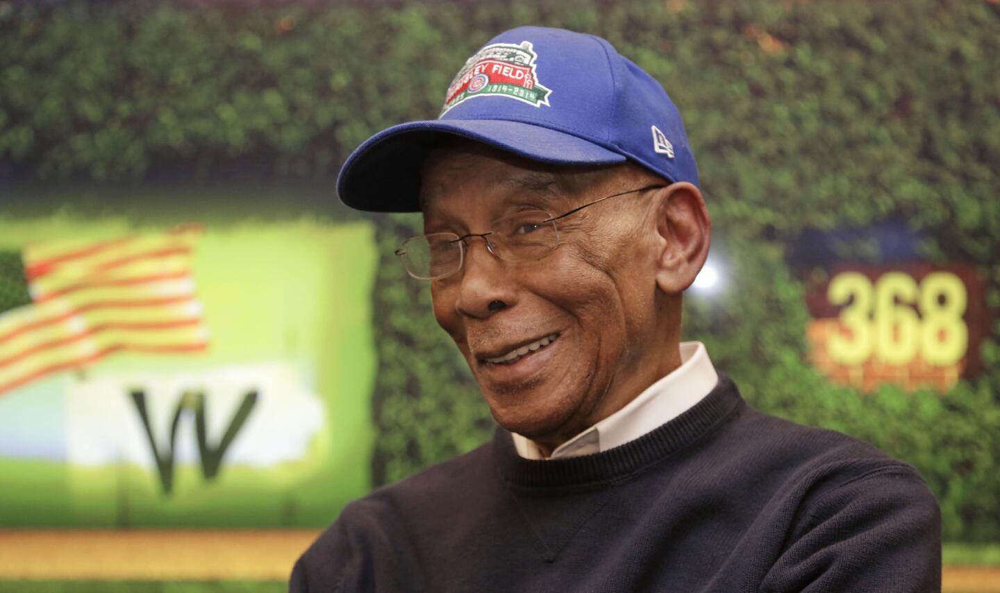 Ernie Banks talks during an interview at Wrigley Field in March 2014.