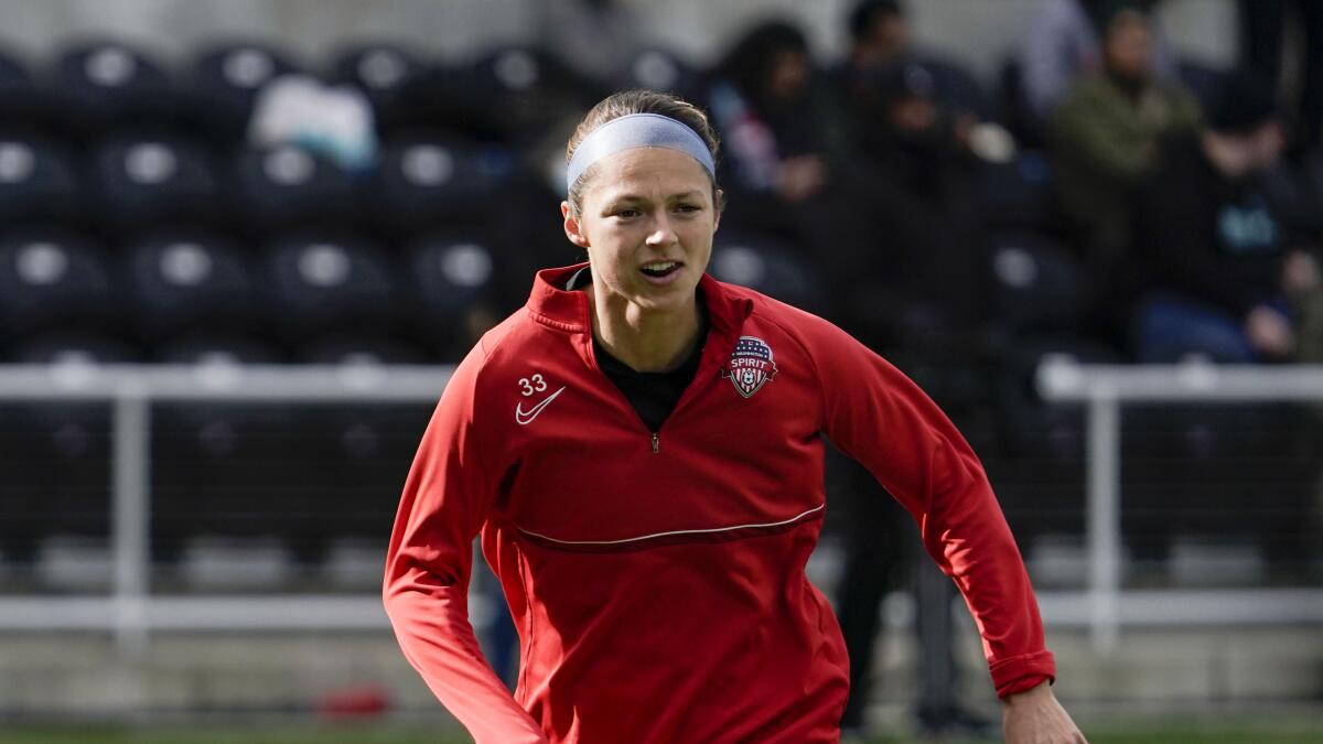 Washington Spirit forward Ashley Hatch warms up.