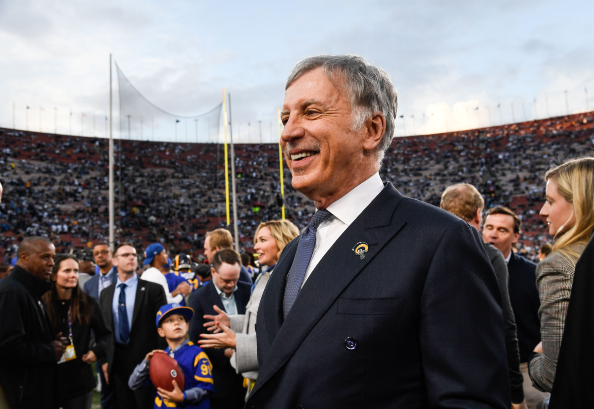 Los Angeles Rams owner Stan Kroenke on the field before a game.