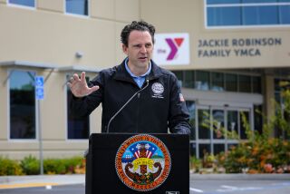 At a press conference in front of the Jackie Robinson Family YMCA, County Supervisor Nathan Fletcher announced a partnership between himself, the YMCA and The San Diego Foundation for childcare opportunities for parents. A $1 million grant from The San Diego Foundation will support the initiative.