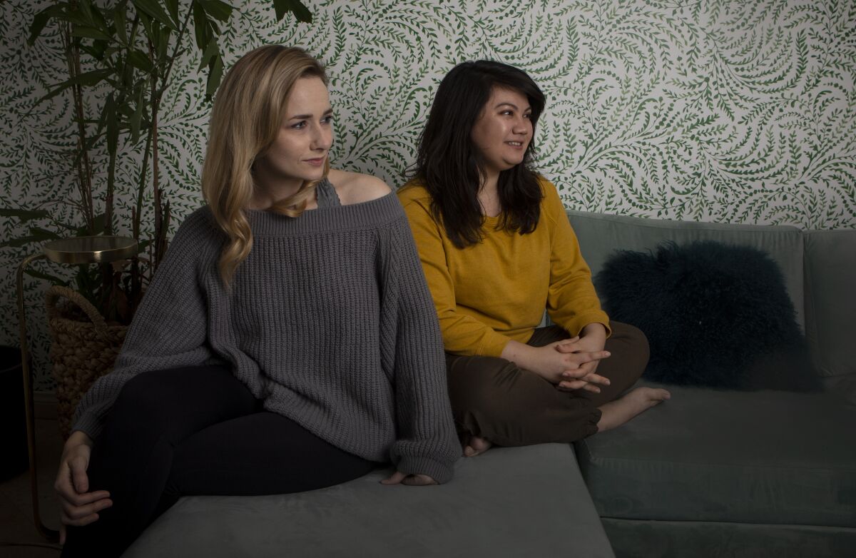 TV writers Deirdre Mangan, left, and Liz Alper in Los Angeles on Oct. 31, 2019.