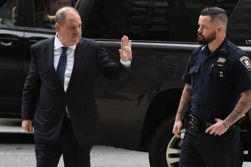 Harvey Weinstein (L) is escorted in by court officers as he arrives at New York Criminal Court on October 11, 2018 for a hearing on his criminal case. (Photo by TIMOTHY A. CLARY / AFP)TIMOTHY A. CLARY/AFP/Getty Images ** OUTS - ELSENT, FPG, CM - OUTS * NM, PH, VA if sourced by CT, LA or MoD **