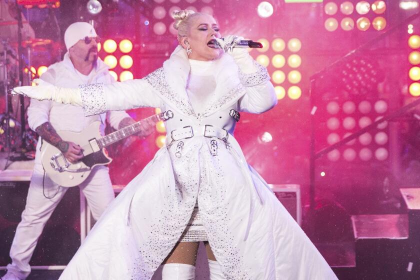 FILE - In this Dec. 31, 2018 file photo, Christina Aguilera performs at the New Year's Eve celebration in Times Square in New York. Aguilera is joining the growing number of musicians launching residencies in Las Vegas. The singer announced Tuesday, Jan. 29, 2019, that Christina Aguilera: The Xperience will open at Zappos Theater at Planet Hollywood Resort & Casino on May 31. Aguilera announced 16 performances. Tickets go on sale Saturday. (Photo by Joe Russo/Invision/AP, File)