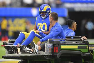 Rams offensive tackle Joe Noteboom is carted off after rupturing his Achilles tendon.