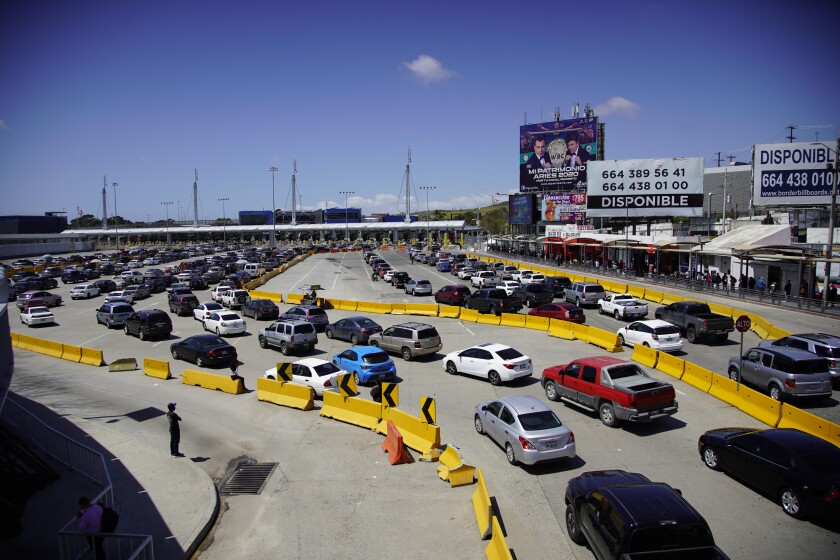 Lines of cars waiting to cross the border from Tijuana into San Diego