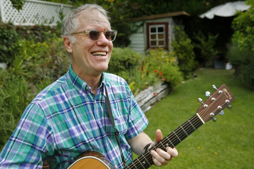 Loudon Wainwright III's latest album, "I Ain't Got the Blues (Yet)," was released Tuesday. Above, the singer-songwriter in July at the West Hollywood home of a friend.