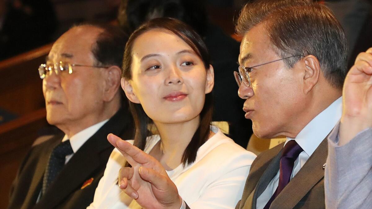 South Korean President Moon Jae-in, right, talks with North Korean leader Kim Jong Un's sister Kim Yo Jong as they watch a concert by Pyongyang's Samjiyon Orchestra at a national theater in Seoul on Feb. 11, 2018.