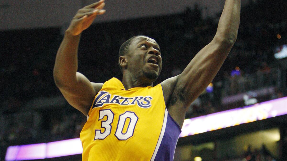 Lakers forward Julius Randle puts up a shot during an exhibition game against the Phoenix Suns on Oct. 21.