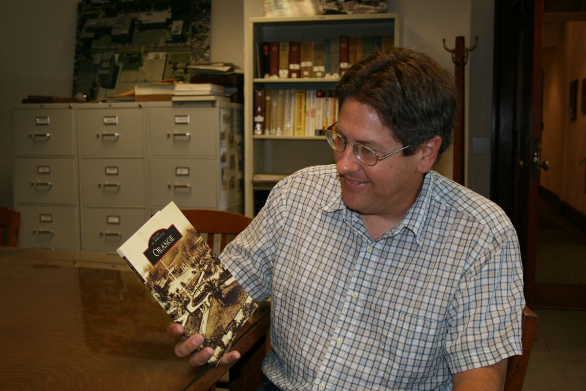 Phil Brigandi with his book "Images of America: Orange"