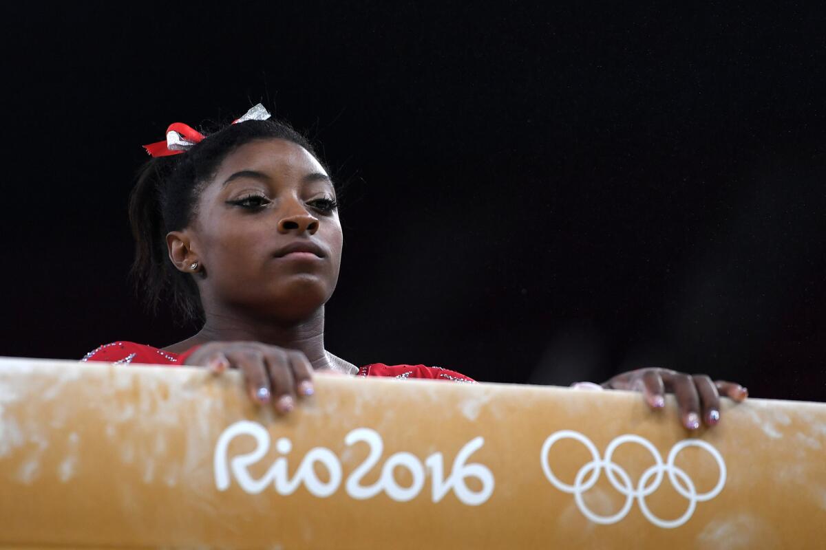 Gymnast Simone Biles and her U.S. teammates begin the assault on the medal count Tuesday.