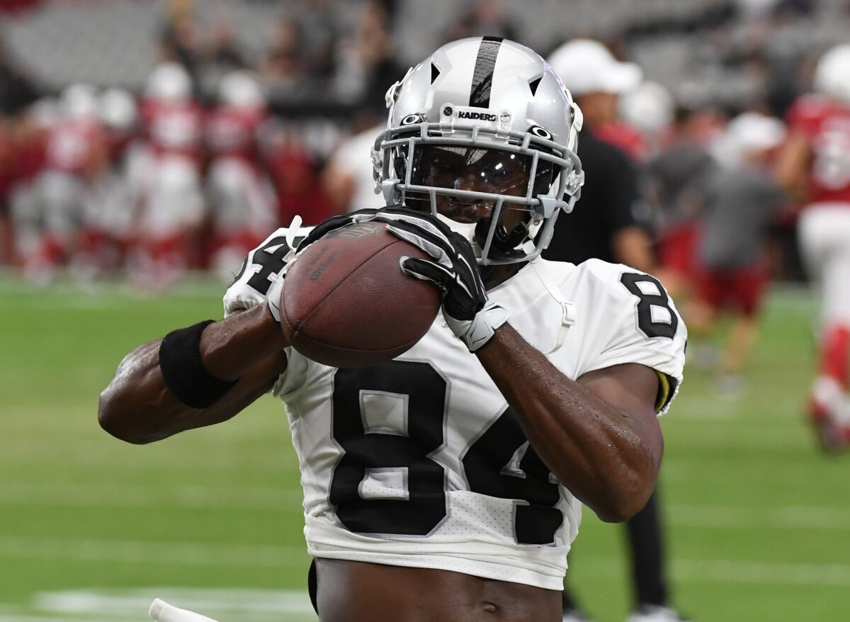 Antonio Brown warms up for the Raiders before a preseason game with the Cardinals on Aug. 15, 2019.