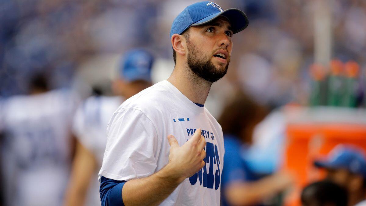 Indianapolis Colts quarterback Andrew Luck looks at the scoreboard during the second half of a preseason game against the Detroit Lions on Aug. 13.