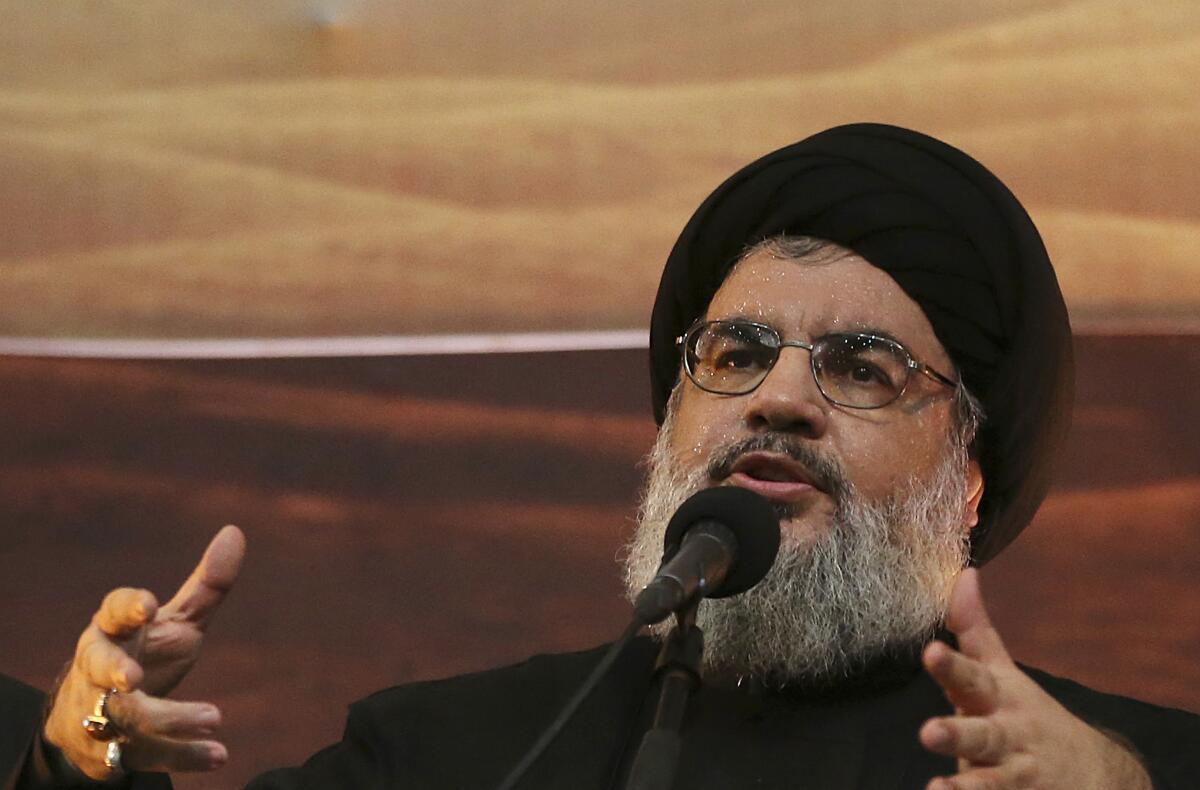 In this 2014 file photo, Hezbollah leader Hassan Nasrallah addresses supporters in a southern suburb of Beirut, Lebanon. 