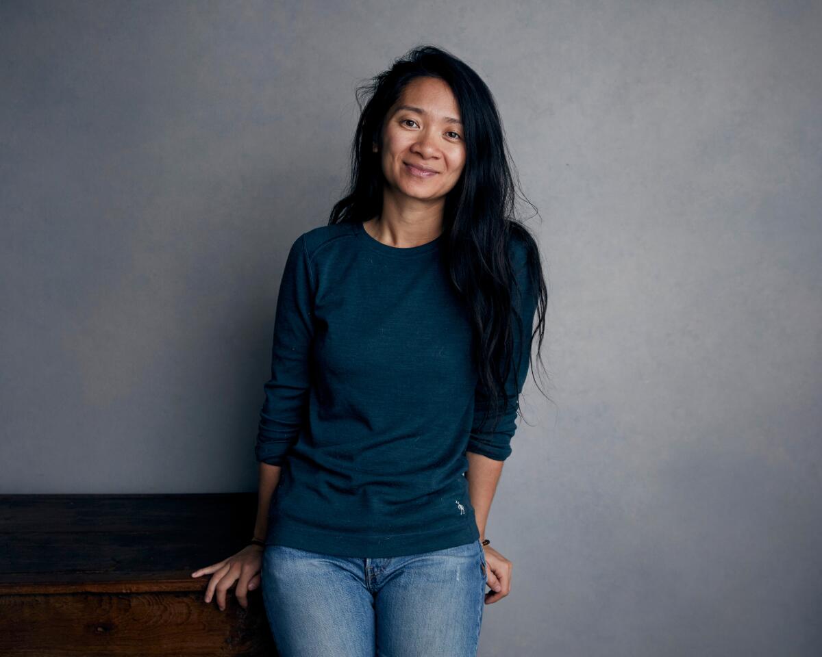 FILE - In this Jan. 22, 2018, file photo, Chloe Zhao poses for a portrait during the Sundance Film Festival in Park City, Utah. Chloe Zhao's success as the first Asian woman and the second woman ever to win a Golden Globe for best director for her film “Nomadland” has not been met with universal applause in the country where she was born.(Photo by Taylor Jewell/Invision/AP, File)