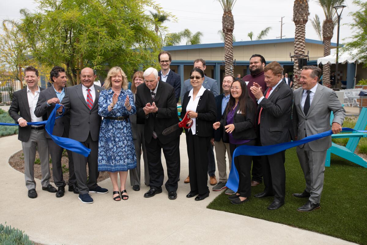 Local, county and congressional representatives were on hand for the ribbon cutting at the grand opening in Stanton.