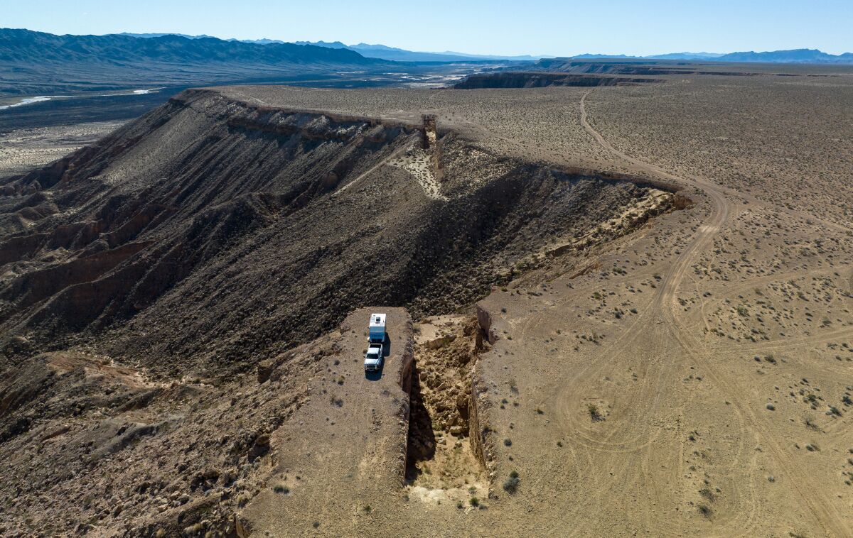A slope and gaps in a mesa.
