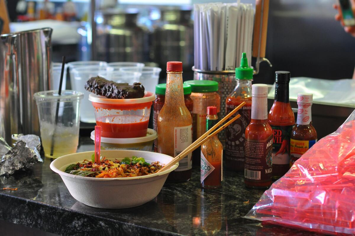 Some of the hot sauces sampled at the recent tasting at Ramen Champ, plus lunch from Chego downstairs.