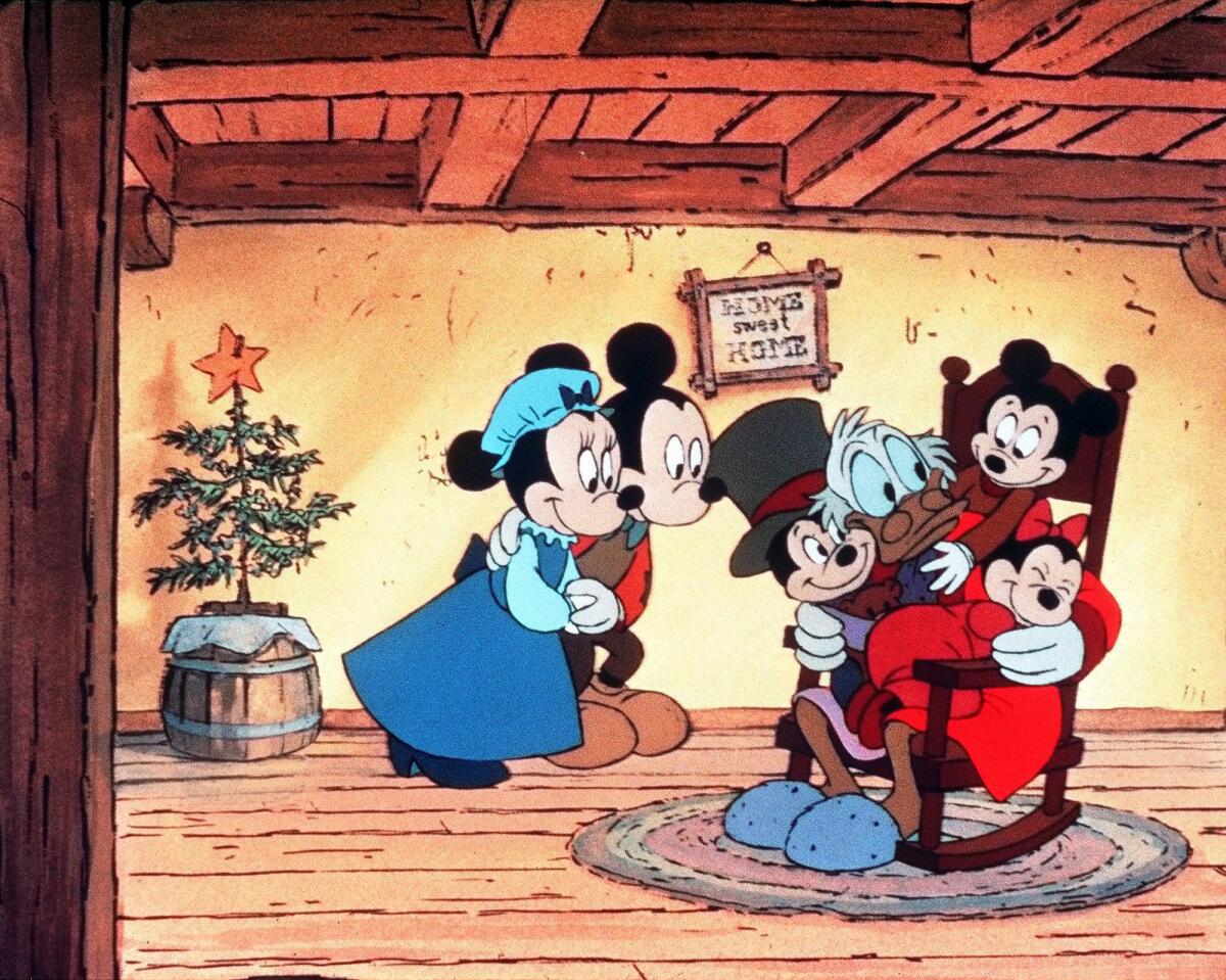 Scrooge, portrayed by Scrooge McDuck (seated), Bob Cratchit (played by Mickey Mouse) in the 1983 animated special