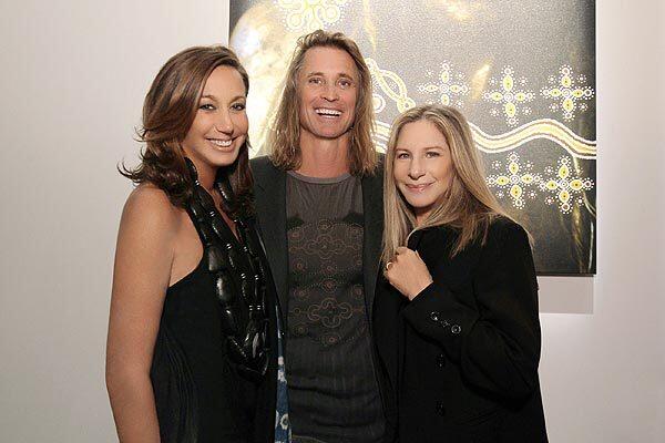 Donna Karan, left, Russell James and Barbra Streisand at the opening of the "Nomad Two Worlds" exhibition in Santa Monica on Tuesday.