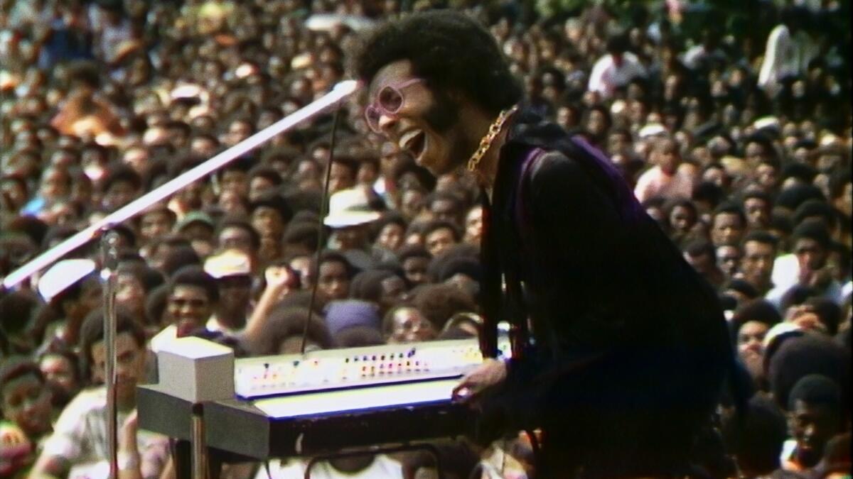 Sly Stone performing at the Harlem Cultural Festival in 1969.