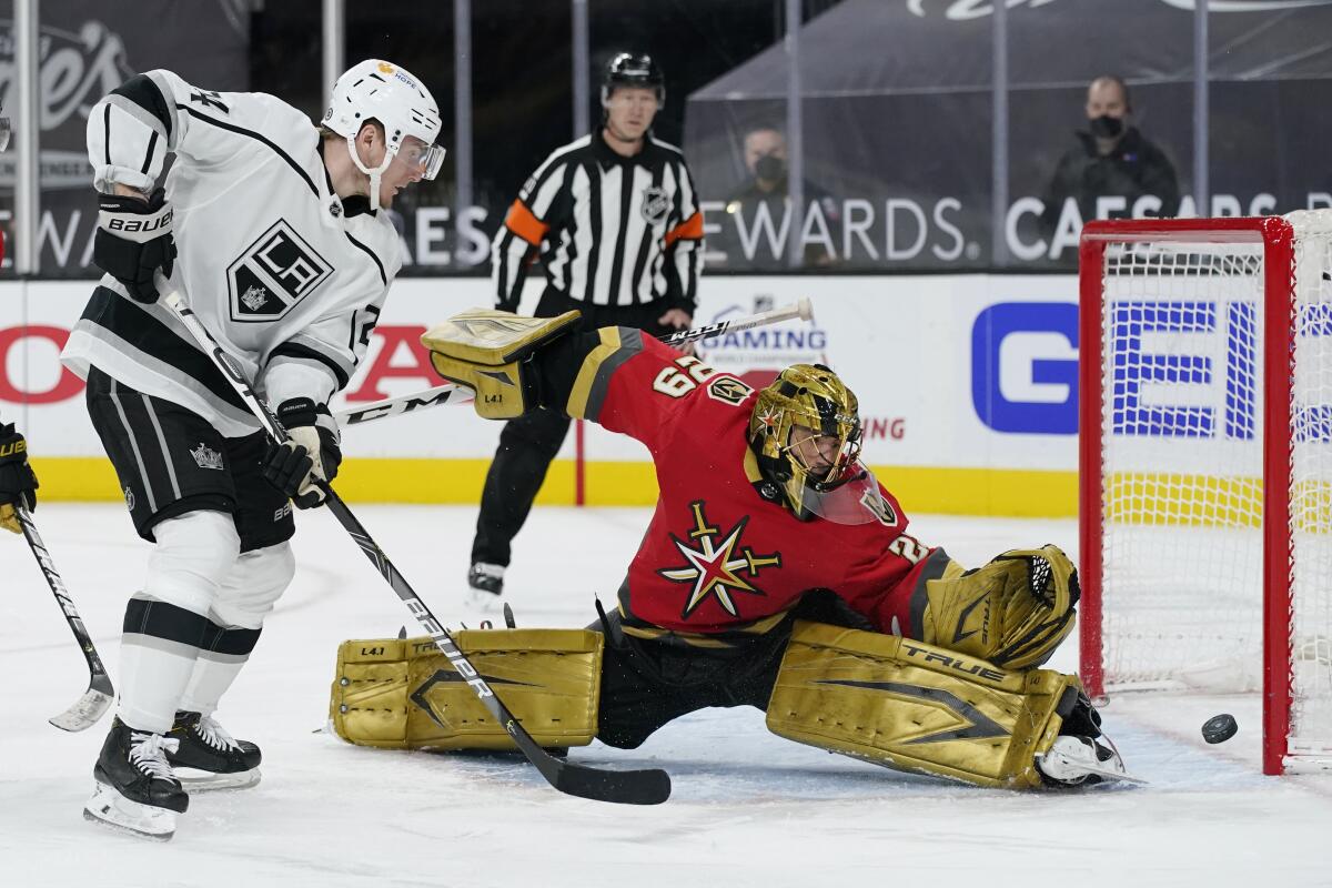 Vegas Golden Knights goaltender Marc-Andre Fleury blocks a shot by Kings' Lias Andersson.