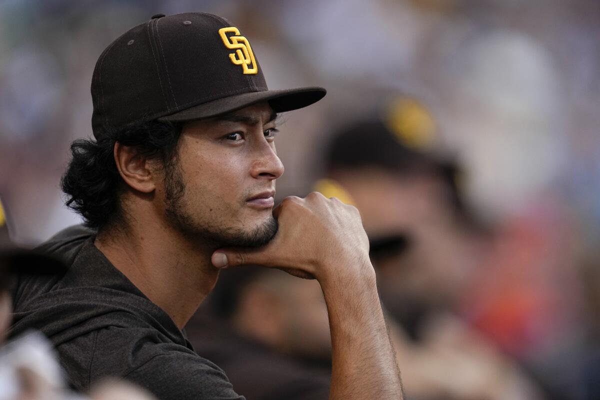 Yu Darvish of the San Diego Padres addresses the media at his