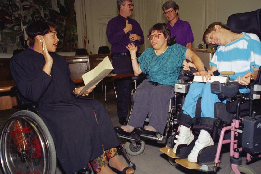 Judy Heumann, center, in Berkeley in 1993.