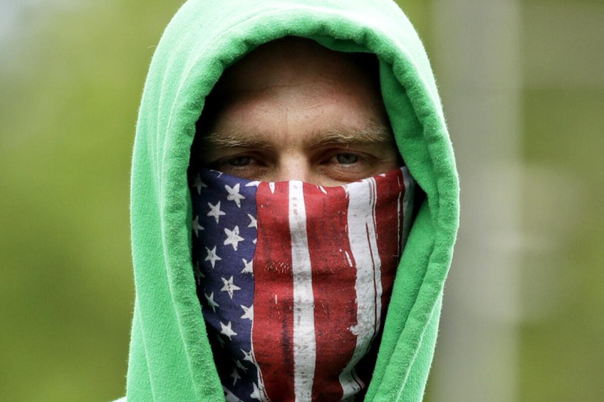 An American flag-masked man. 