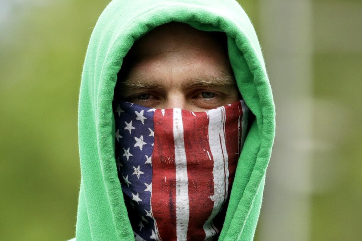 An American flag-masked man.