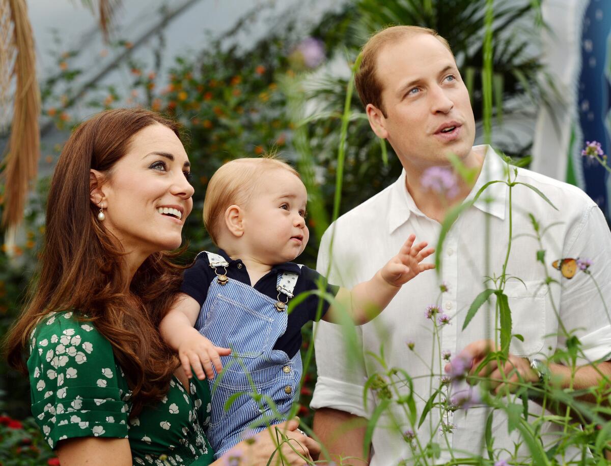 The Duke and Duchess of Cambridge with 1-year-old Prince George in July.