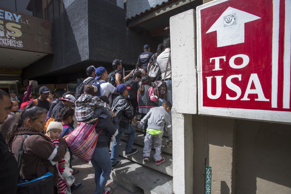 Migrants in Tijuana ask for asylum