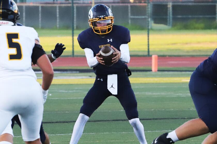 Marina's quarterback Garrett Hunnicut (3) during Marina High School's varsity football season home opener against Sunny Hills High School's varsity football team at Westminster High School in Westminster on Friday, August 18, 2023. (Photo by James Carbone)