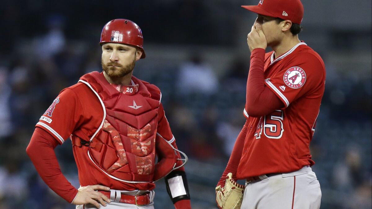 Sinclair Broadcast Group agreed to pay $9.6 billion for 21 regional sports channels, including Fox Sports West, which broadcasts Angels games. Pictured: Angels catcher Jonathan Lucroy and pitcher Tyler Skaggs.