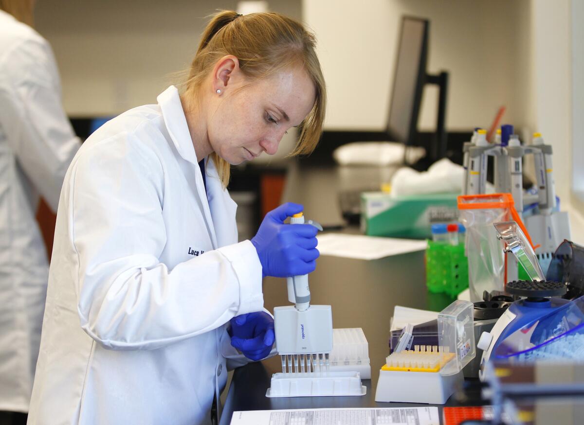 A clinical laboratory scientist prepares patient samples for sequencing at Rady Children's Institute for Genomic Medicine.