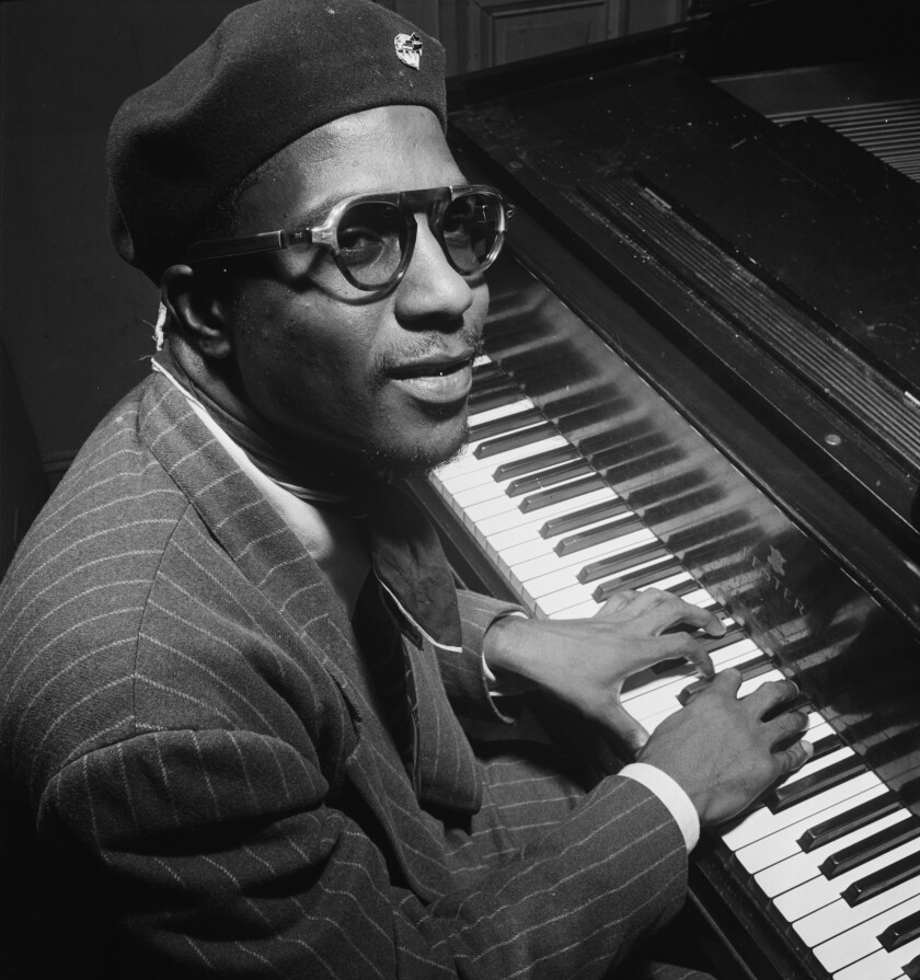 Thelonious Monk is shown in the 1940s at Minton's Playhouse in Harlem