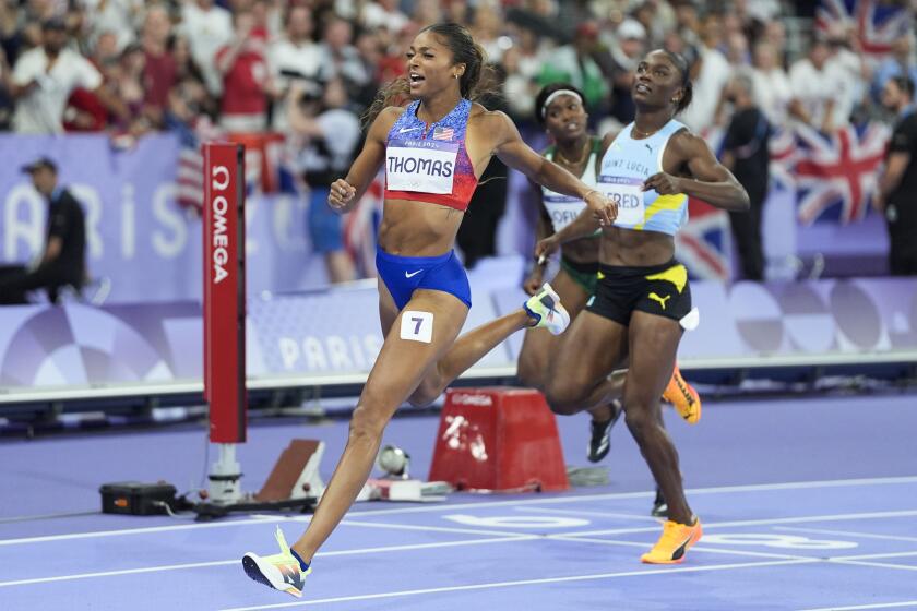 American Gabrielle Thomas celebrates after winning the women's 200-meter final at the 2024 Summer Olympics Tuesday.