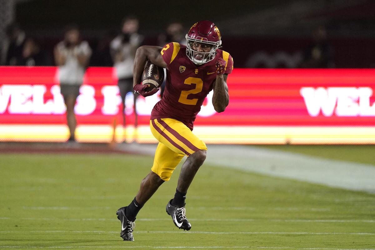 USC wide receiver Brenden Rice runs the ball during a win over Arizona State on Oct. 1.