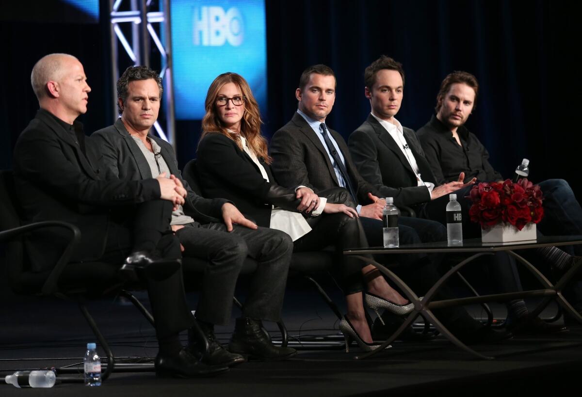 Director/executive producer Ryan Murphy, left, and actors Mark Ruffalo, Julia Roberts, Matt Bomer, Jim Parsons and Taylor Kitsch speak onstage during the 'The Normal Heart' panel discussion at the Television Critics Assn. tour at the Langham Huntington Hotel in Pasadena.
