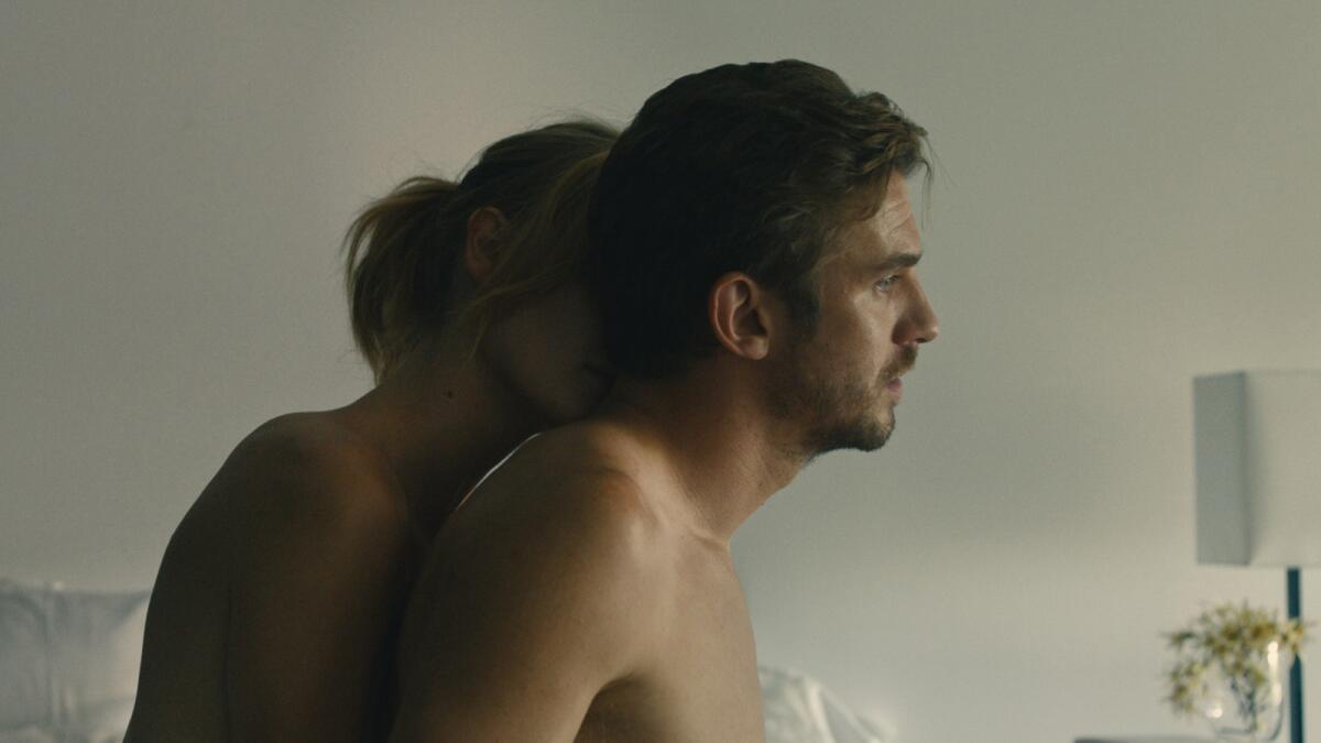 Kerry Bishe and Dan Stevens in the film "The Ticket."