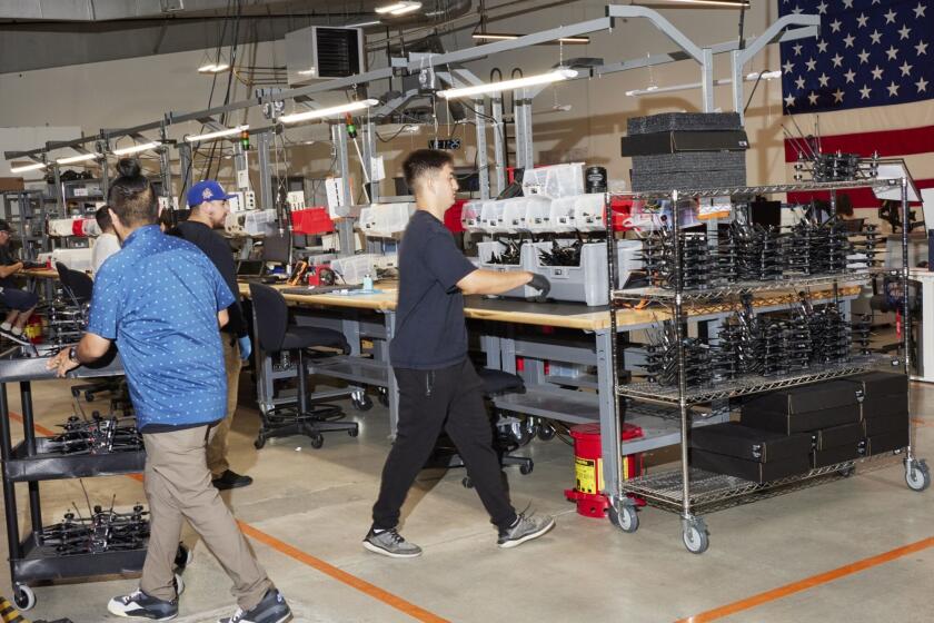 Drones being assembled at the Neros headquarters.