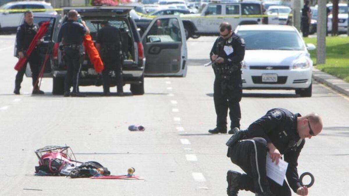 Police working at the scene of a car crash 