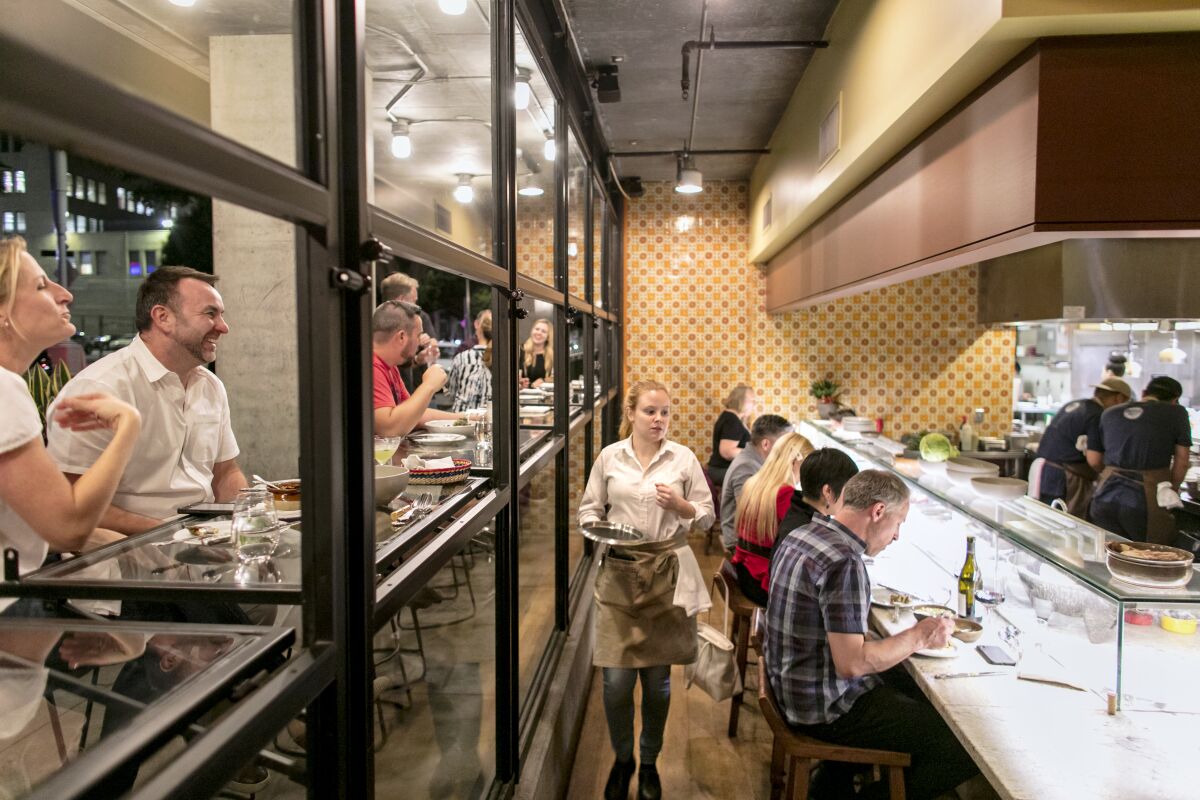 Customers fill the bar at Broken Spanish in 2019.