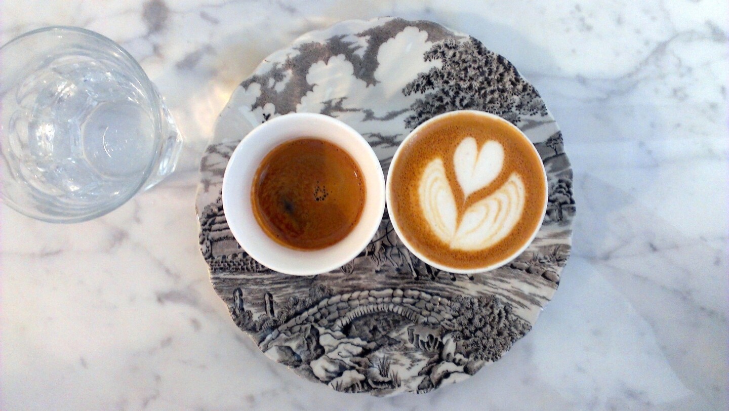 A remodeled Sqirl cafe's 1 & 1: a shot of espresso served alongside a macchiato.