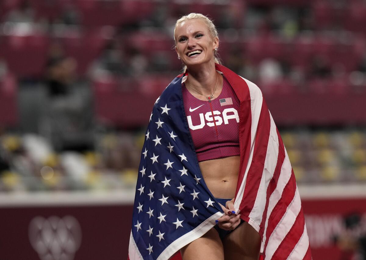 Gold medalist Katie Nageotte celebrates after winning the final of the women's pole vault at the 2020 Summer Olympics, Thursday, Aug. 5, 2021, in Tokyo.(AP Photo/Francisco Seco)