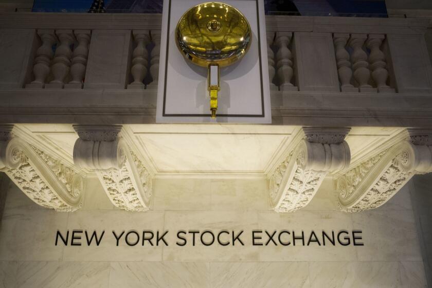 FILE- In this May 10, 2018, file photo, the opening bell hangs above the trading floor at the New York Stock Exchange. The U.S. stock market opens at 9:30 a.m. EDT on Monday, May 21. (AP Photo/Mark Lennihan, File)