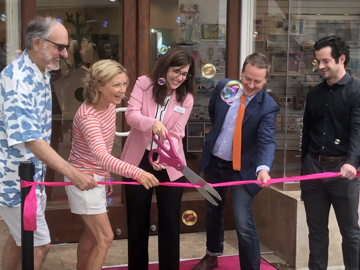 A ribbon cutting ceremony marked the opening of the Art + Play Space in Del Mar.