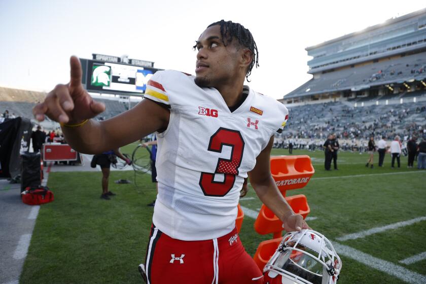 Maryland quarterback Taulia Tagovailoa runs off the field following an NCAA college football game against Michigan State, Saturday, Sept. 23, 2023, in East Lansing, Mich. (AP Photo/Al Goldis)